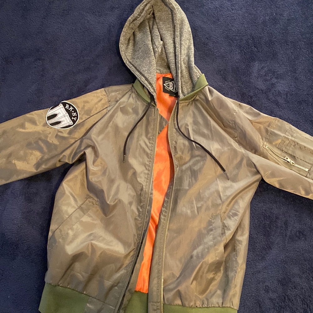 Hooded wind breaker.